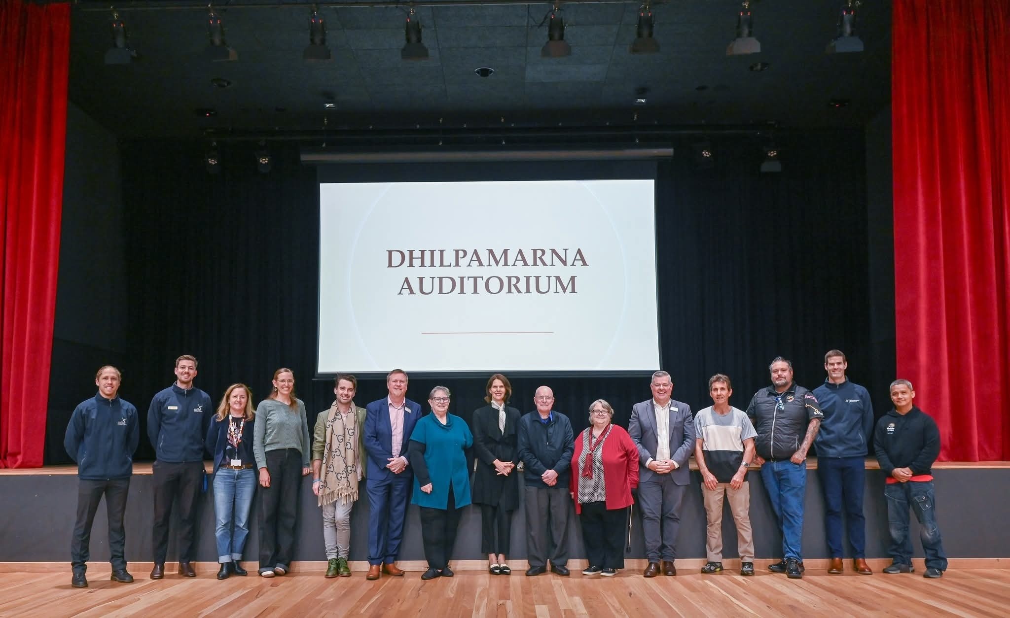 The naming ceremony group on stage at Dhilpamarna Auditorium, Norlane ARC