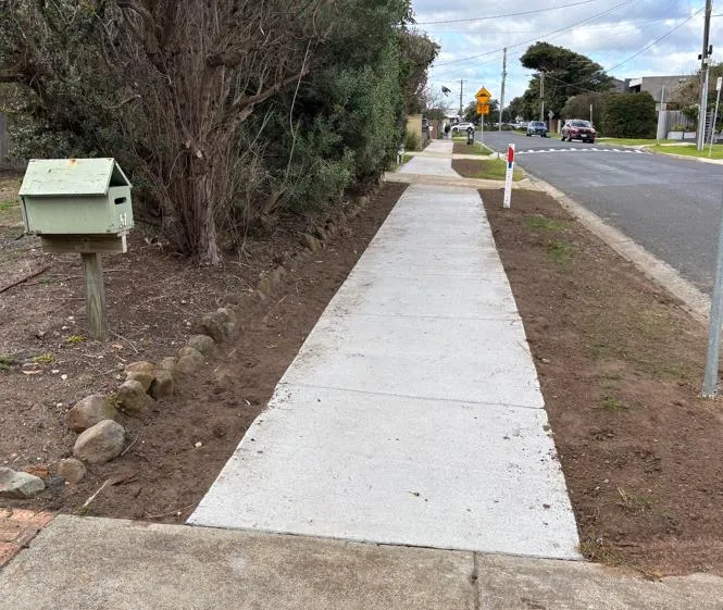 A newly constructed concrete footpath along The Parade