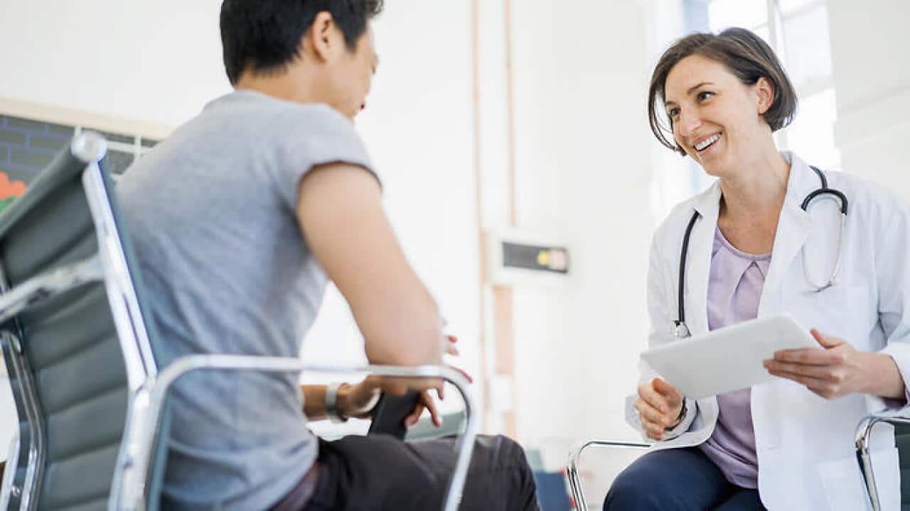 A doctor in consultation with a patient