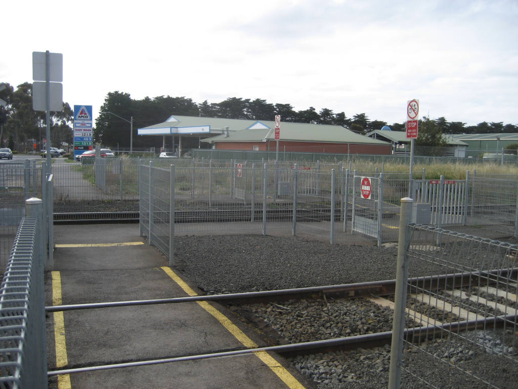 The pedestrian crossing point beside APCO at the McClelland Avenue level crossing