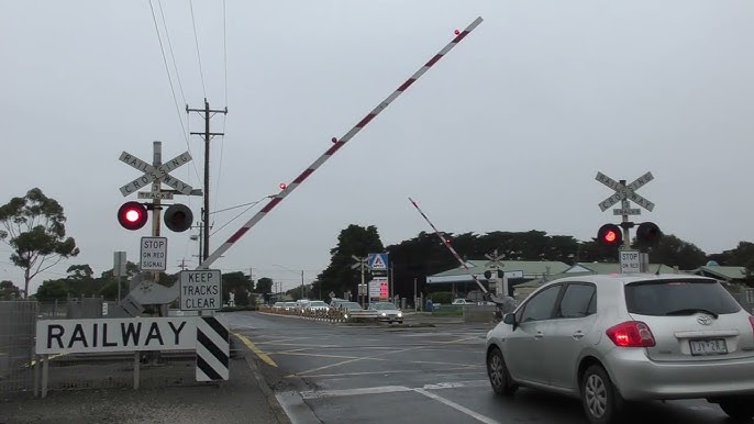 Boom gates down at the McClelland Avenue, Lara level crossing