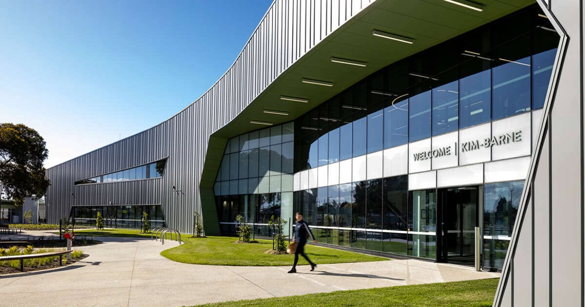 The exterior of the Northern Aquatic and Community Hub in Norlane, a modern building with the Welcome Kim-barne signage