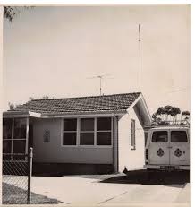 A weatherboard house, a Kombi in the drive, an aerial on the roof. The standard Lara block of its day.